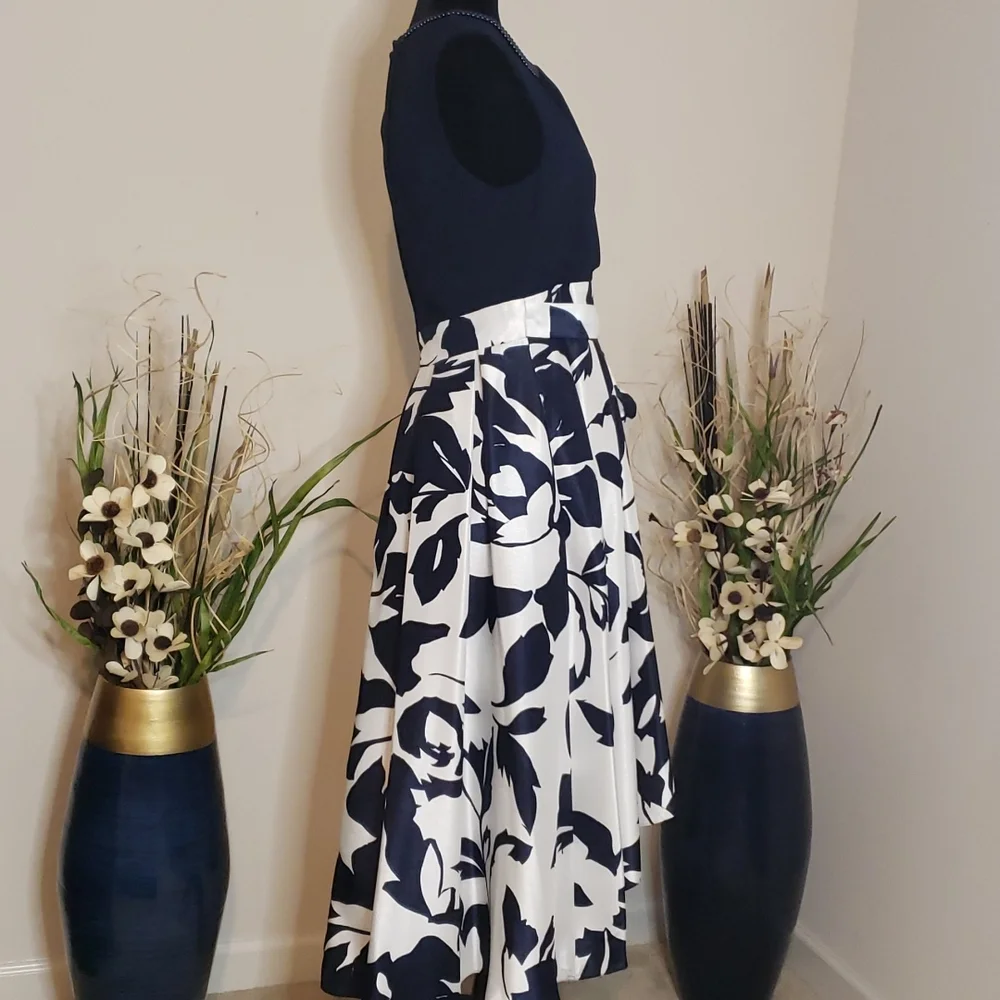 High-low navy blue and white dress, with two strands of navy blue pearls. - Picture 6 of 9